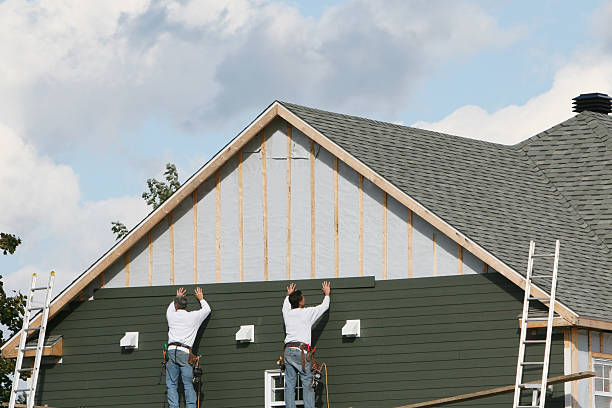 Professional Siding Installation technician working in Needham, MA
